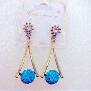 Earrings Crystals Turquoise ball set in Gold tone.